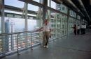 Photographer on Sky Bridge of Petronas Towers, Kuala Lumpur